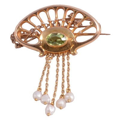 Lot 236 - A peridot and peridot and pearl brooch.