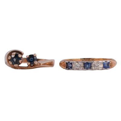 Lot 42 - Two gold rings, a half hoop and a sapphire crossover ring.