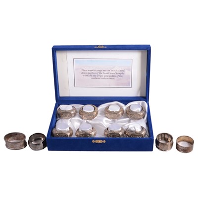 Lot 107 - White metal and silver napkin rings.