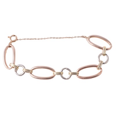 Lot 196 - A three colour bracelet marked 750.