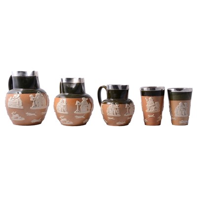 Lot 104 - Set of three graduated silver-rimmed Royal Doulton Harvest jug, and two matching beakers.
