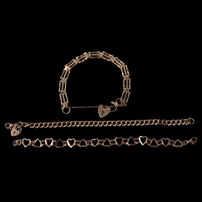 Lot 201 - Three 9 carat yellow gold bracelets.