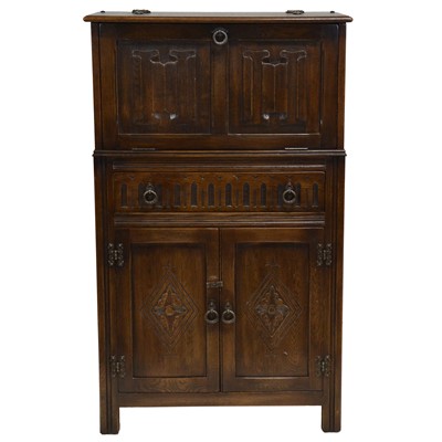 Lot 465 - Old Charm cocktail cabinet, standard lamp, bookcase, and a coffee table