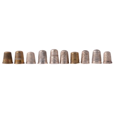 Lot 325 - Seventy silver, brass and other metal thimbles.