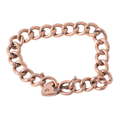 Lot 190 - A rose metal hollow curb link bracelet.