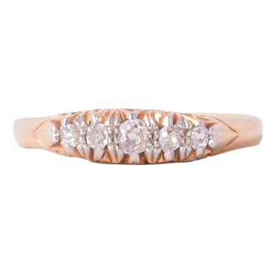Lot 81 - A diamond five stone ring.