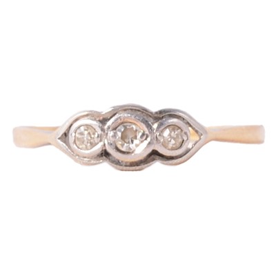 Lot 78 - A vintage diamond three stone ring.