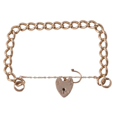 Lot 189 - A 9 carat yellow gold solid curb link bracelet with padlock fastener.