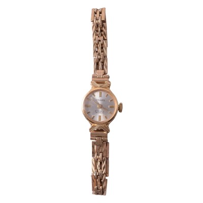 Lot 1069 - Polaris - a lady's gold bracelet watch.