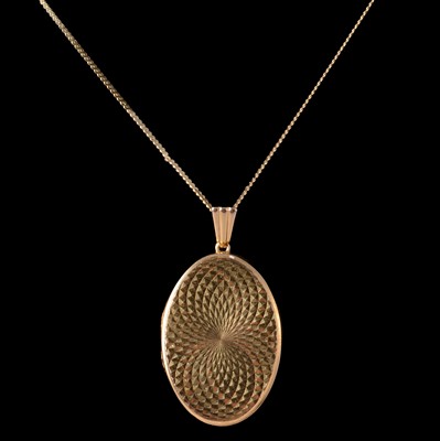 Lot 285 - A 9 carat yellow gold locket and chain.