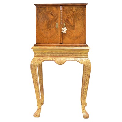 Lot 309 - Early 18th Century walnut cabinet on a later stand