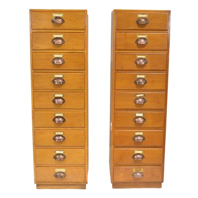 Lot 435 - Two sets of light oak haberdashery drawers