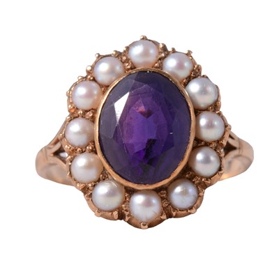 Lot 1 - An amethyst and cultured pearl dress ring.