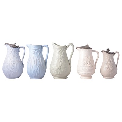Lot 129 - Ten Victorian relief-moulded jugs