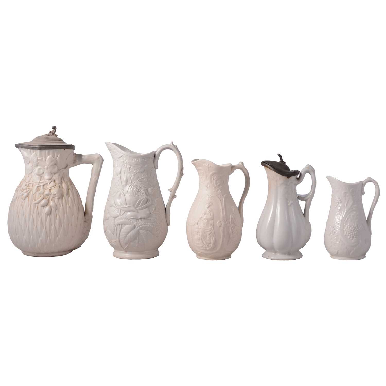 Lot 39 - Nine white stoneware jugs