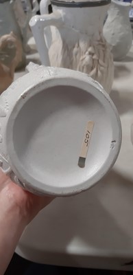 Lot 39 - Nine white stoneware jugs