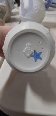 Lot 39 - Nine white stoneware jugs