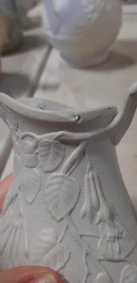 Lot 39 - Nine white stoneware jugs