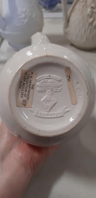 Lot 39 - Nine white stoneware jugs