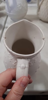 Lot 39 - Nine white stoneware jugs