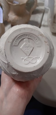 Lot 39 - Nine white stoneware jugs