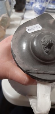 Lot 39 - Nine white stoneware jugs