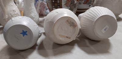 Lot 39 - Nine white stoneware jugs