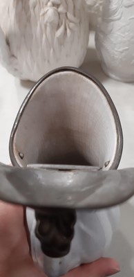 Lot 39 - Nine white stoneware jugs