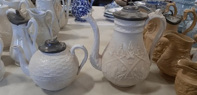 Lot 44 - Six Staffordshire stoneware jugs and pots