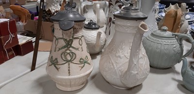Lot 44 - Six Staffordshire stoneware jugs and pots