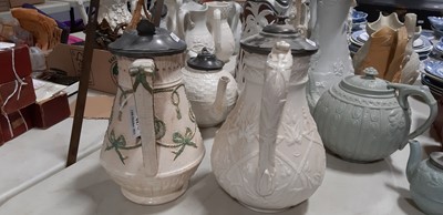 Lot 44 - Six Staffordshire stoneware jugs and pots