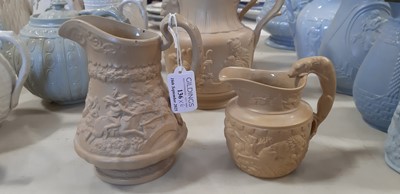 Lot 41 - Six buff-coloured relief-moulded jugs
