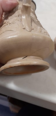 Lot 41 - Six buff-coloured relief-moulded jugs