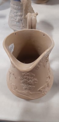 Lot 41 - Six buff-coloured relief-moulded jugs