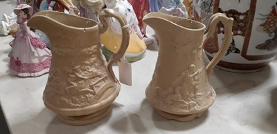 Lot 41 - Six buff-coloured relief-moulded jugs