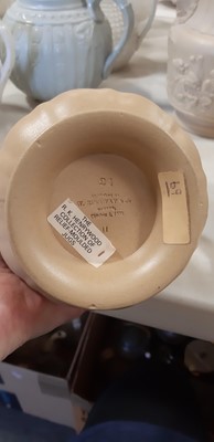 Lot 41 - Six buff-coloured relief-moulded jugs