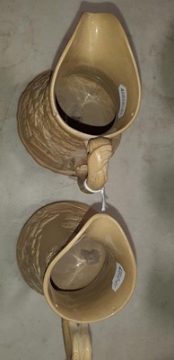 Lot 41 - Six buff-coloured relief-moulded jugs