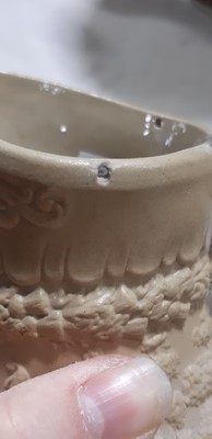 Lot 41 - Six buff-coloured relief-moulded jugs