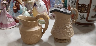 Lot 41 - Six buff-coloured relief-moulded jugs