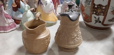 Lot 41 - Six buff-coloured relief-moulded jugs