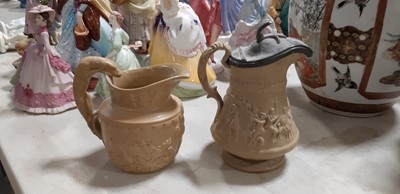 Lot 41 - Six buff-coloured relief-moulded jugs