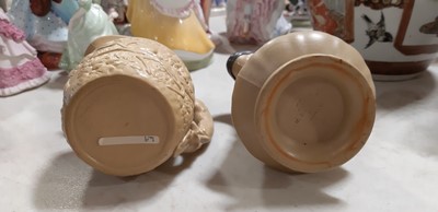 Lot 41 - Six buff-coloured relief-moulded jugs