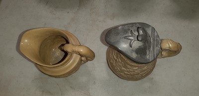 Lot 41 - Six buff-coloured relief-moulded jugs