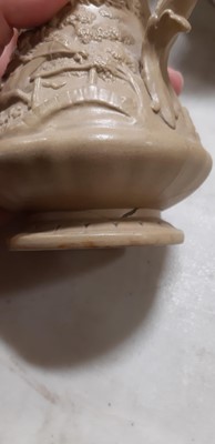 Lot 41 - Six buff-coloured relief-moulded jugs