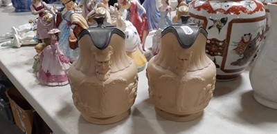 Lot 41 - Six buff-coloured relief-moulded jugs