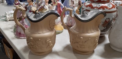 Lot 41 - Six buff-coloured relief-moulded jugs