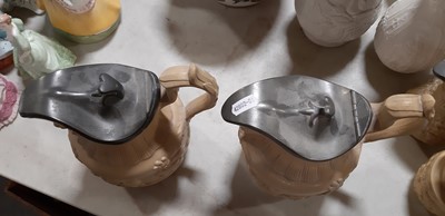 Lot 41 - Six buff-coloured relief-moulded jugs