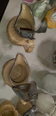 Lot 41 - Six buff-coloured relief-moulded jugs