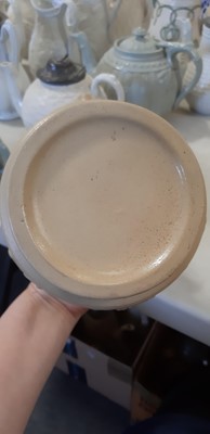 Lot 41 - Six buff-coloured relief-moulded jugs