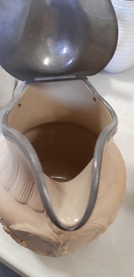 Lot 41 - Six buff-coloured relief-moulded jugs